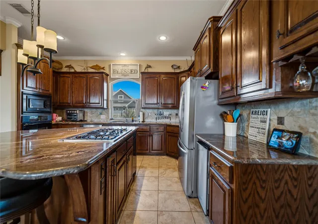 Photo 4 of Single family home for sale at 8 Loggerhead, Hitchcock, TX 77563 | MLS# 9805655 | Listing updated on 2026-04-02