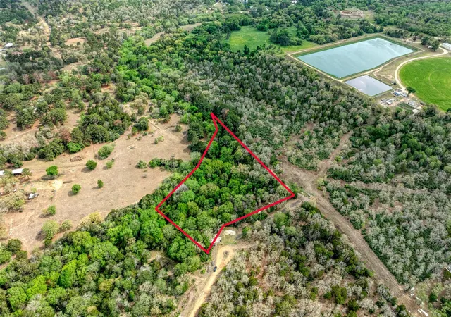 Photo 1 of Land for sale at Tbd Ripple Brk Dr, Bastrop, TX 78602 | MLS# 6531824 | Listing updated on 2026-04-08