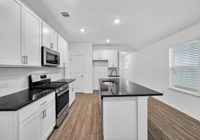 Photo 2 of Single family home for sale at 14130 Edna Maxine Walk, Del Valle, TX 78617 | MLS# 1139372 | Listing updated on 2026-10-06