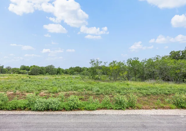 Photo 1 of Land for sale at Tbd Holiday Dr, Bastrop, TX 78602 | MLS# 8818118 | Listing updated on 2026-07-29