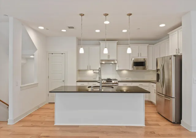 Photo 2 of Townhouse for sale at 7209 Bassett Ct, Austin, TX 78741 | MLS# 6679261 | Listing updated on 2026-09-18