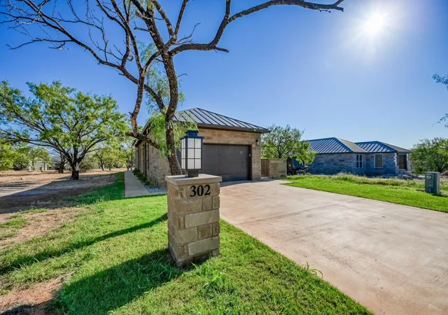 Photo 2 of Single family home for sale at 302 Parallel Cir, Horseshoe Bay, TX 78657 | MLS# 7056496 | Listing updated on 2026-09-14