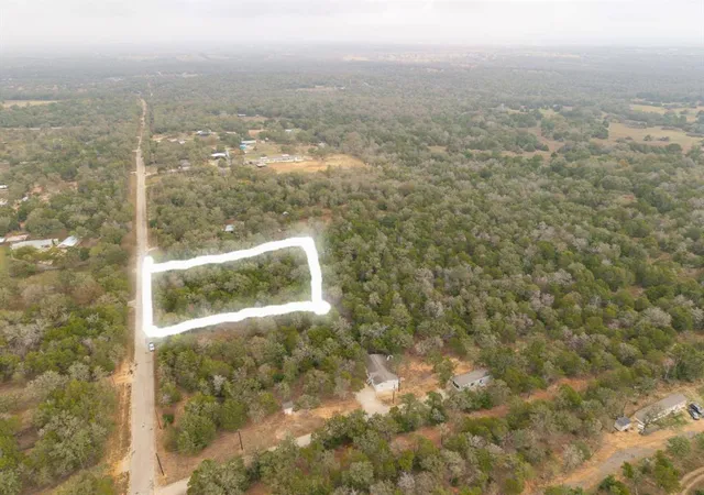 Photo 2 of Land for sale at Lot #90773 Milam Ln, Bastrop, TX 78602 | MLS# 2681797 | Listing updated on 2026-08-10