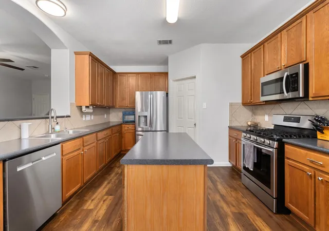 Photo 3 of Single family home for sale at 1107 Concan Dr, Hutto, TX 78634 | MLS# 5408849 | Listing updated on 2026-08-27