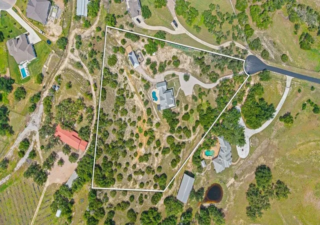 Photo 4 of Single family home for sale at 1051 Trailhead Cir, Dripping Springs, TX 78620 | MLS# 2678950 | Listing updated on 2026-09-22
