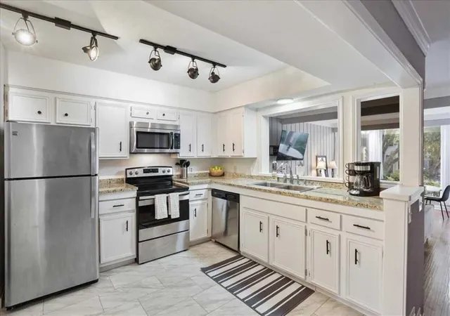 Photo 3 of Condo for sale at 156 World Of Tennis Sq, Lakeway, TX 78738 | MLS# 4228875 | Listing updated on 2026-08-20