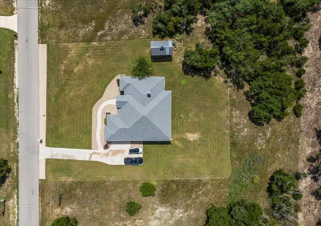Photo 3 of Single family home for sale at 104 Draper Ln, Bertram, TX 78605 | MLS# 7513324 | Listing updated on 2026-08-03