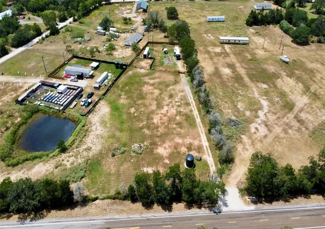 1st image of 1856 Fm 2104 Hwy, Paige, TX 78659 | MLS# 9040250