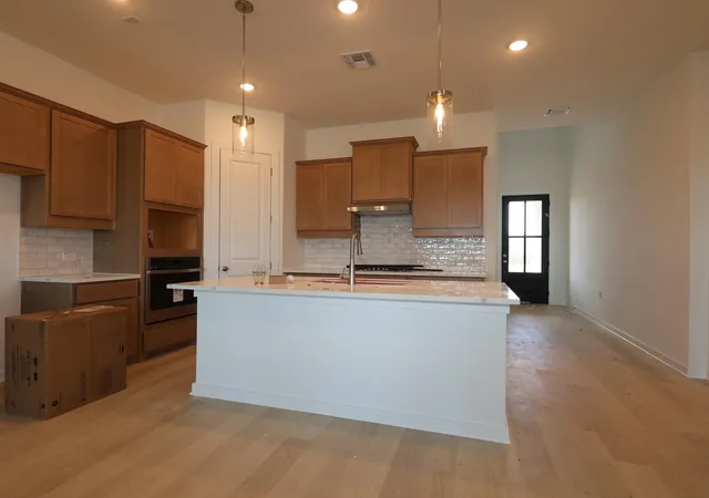 Photo 3 of Single family home for sale at 135 Pinky Varner Ct, Buda, TX 78610 | MLS# 5052685 | Listing updated on 2026-10-09