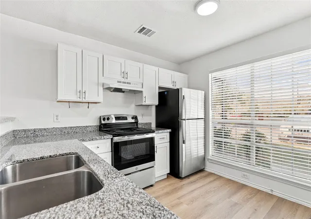 Photo 2 of Condo for sale at 1834 River Xing Cir #D, Austin, TX 78741 | MLS# 2350133 | Listing updated on 2026-10-17