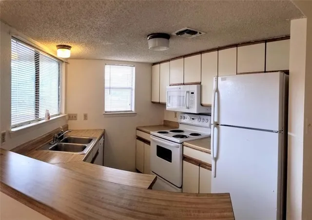 Photo 2 of Condo for sale at 2500 Burleson Rd #215, Austin, TX 78741 | MLS# 4507298 | Listing updated on 2026-09-13