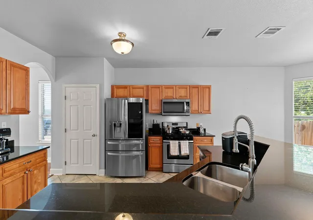 Photo 3 of Single family home for sale at 12220 Tanglewild Dr, Austin, TX 78758 | MLS# 3410633 | Listing updated on 2026-10-11