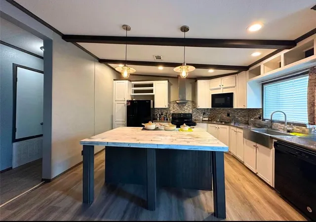 Photo 1 of Manufactured home for sale at 2130 Mathias Ln, Kyle, TX 78640 | MLS# 3779464 | Listing updated on 2026-09-22
