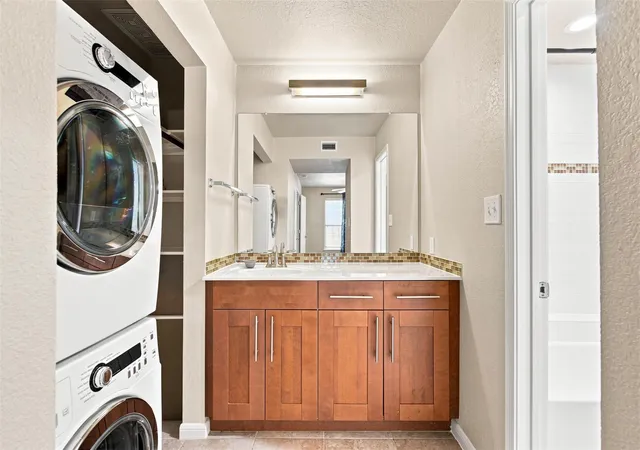 Listing Photo 2 - Condo for sale in building located at 7685 Northcross Dr, Austin, TX 78757 - Unit #908