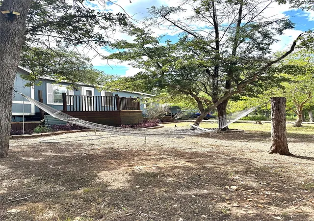 Photo 1 of Manufactured home for sale at 117 Shoshoni Dr, Smithville, TX 78957 | MLS# 5688357 | Listing updated on 2026-09-29