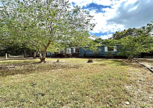 Photo 2 of Manufactured home for sale at 117 Shoshoni Dr, Smithville, TX 78957 | MLS# 5688357 | Listing updated on 2026-09-29