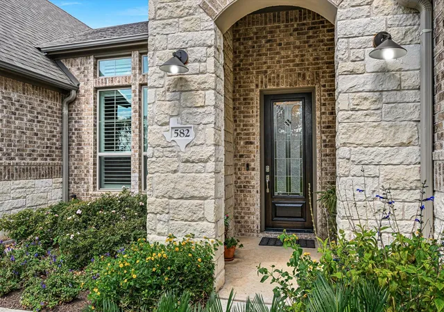 Photo 1 of Single family home for sale at 582 Peakside Cir, Dripping Springs, TX 78620 | MLS# 5657345 | Listing updated on 2026-10-30