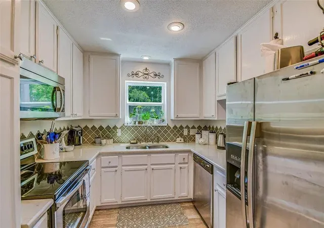 Photo 1 of Condo for sale at 6600 Valleyside Rd #B8, Austin, TX 78731 | MLS# 5158467 | Listing updated on 2026-10-08