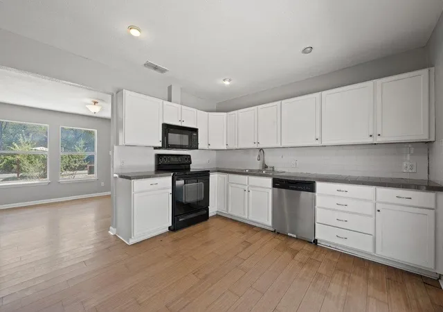 Photo 3 of Single family home for sale at 1304 Lily Ter, Austin, TX 78741 | MLS# 6708222 | Listing updated on 2026-09-28