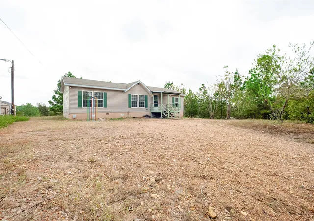 Photo 2 of Manufactured home for sale at 157 Lakeside Dr, Bastrop, TX 78602 | MLS# 3436573 | Listing updated on 2026-10-06
