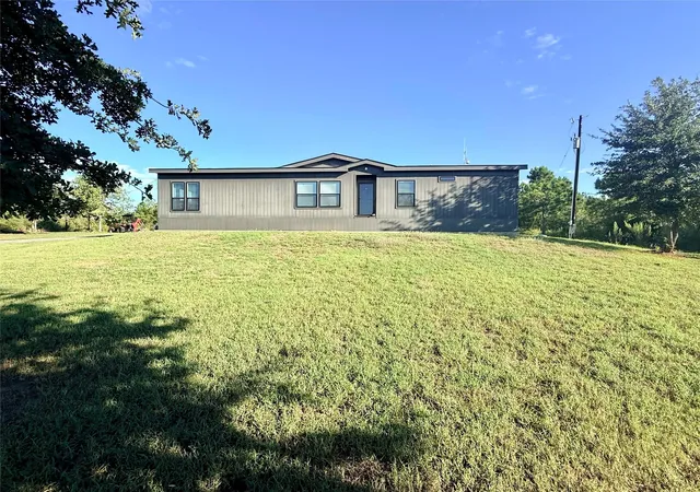Photo 1 of Manufactured home for sale at 247 W Broken Tree Ln, Smithville, TX 78957 | MLS# 3510517 | Listing updated on 2026-10-06
