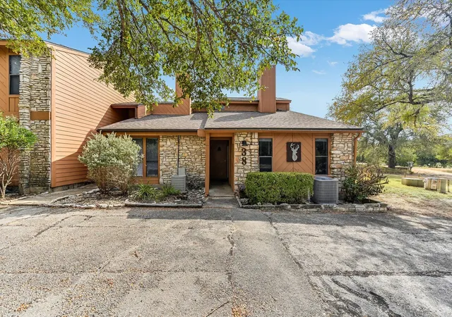 Photo 1 of Townhouse for sale at 38 Cypress Fairway Vlg, Wimberley, TX 78676 | MLS# 9290008 | Listing updated on 2026-10-08
