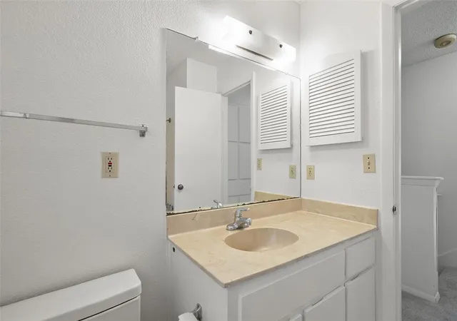 Listing Photo 4 - Condo for sale in building located at 11435 Ptarmigan Dr, Austin, TX 78758 - Unit #A&B