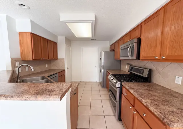 Photo 2 of Single family home for sale at 13020 Moorcroft Ln, Austin, TX 78729 | MLS# 8650012 | Listing updated on 2026-10-10