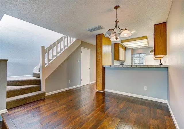 Photo 1 of Condo for sale at 7122 Wood Holw Dr #14, Austin, TX 78731 | MLS# 2784628 | Listing updated on 2026-10-26