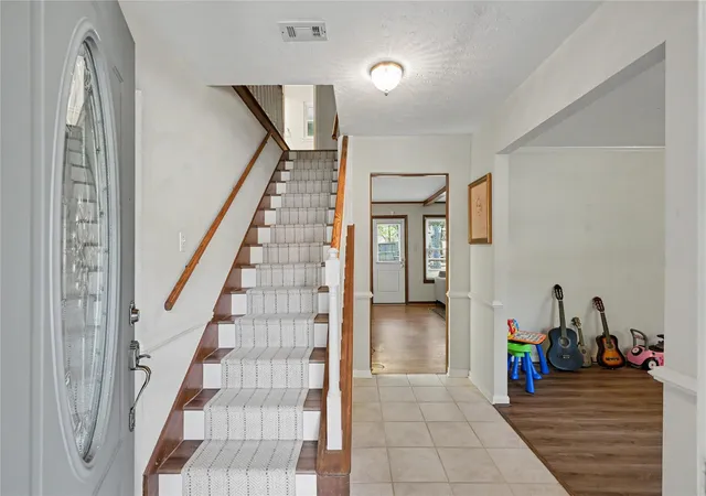 Photo 3 of Single family home for sale at 407 S Rivershire Dr, Conroe, TX 77304 | MLS# 7279593 | Listing updated on 2026-10-27
