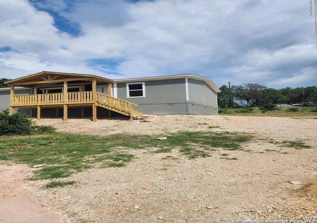 Photo 1 of Manufactured home for sale at 1214 Deer Run Pass, Canyon Lake, TX 78133 | MLS# 1795461 | Listing updated on 2025-09-14