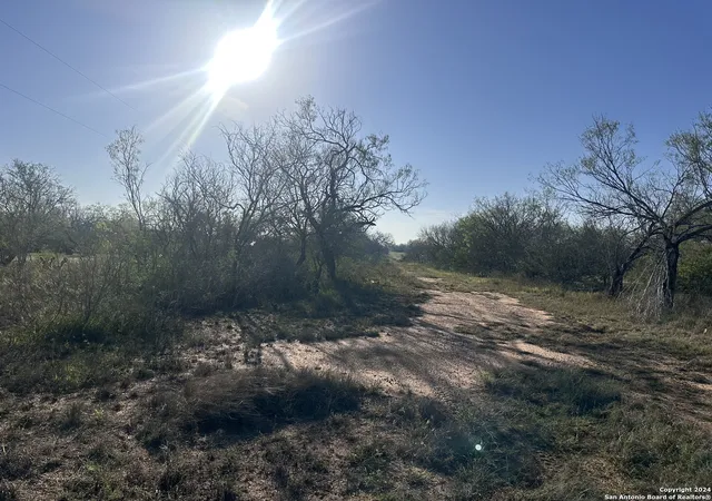 Photo 1 of Land for sale at 5870 County Road 405, Floresville, TX 78114 | MLS# 1830487 | Listing updated on 2025-12-17