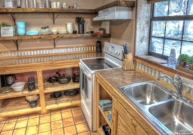 Photo 3 of Single family home for sale at 65 Pineview Rd, Concan, TX 78838 | MLS# 1839629 | Listing updated on 2025-02-04