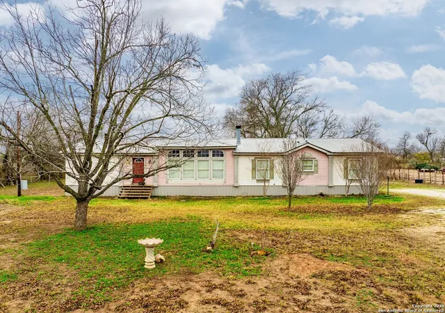 Photo 1 of Manufactured home for sale at 1545 County Road 665, Devine, TX 78016 | MLS# 1841033 | Listing updated on 2025-12-19