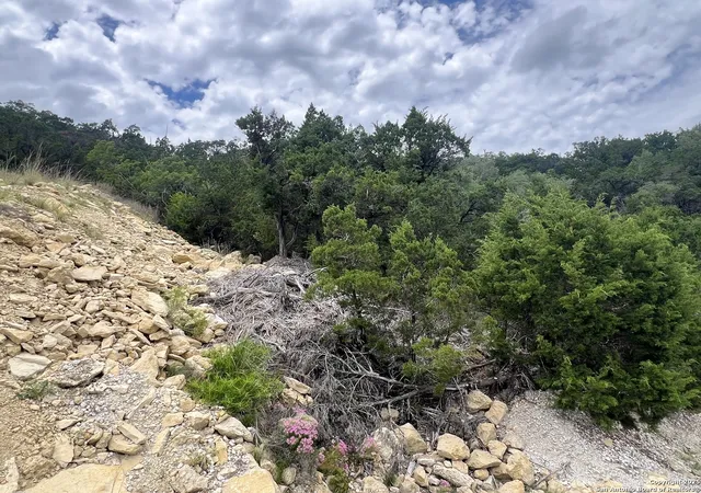 Photo 2 of Land for sale at 1597 Trail Pass, Canyon Lake, TX 78133 | MLS# 1876234 | Listing updated on 2026-04-09