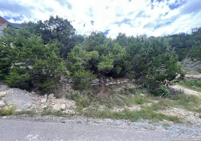 Photo 1 of Land for sale at 1597 Trail Pass, Canyon Lake, TX 78133 | MLS# 1876234 | Listing updated on 2026-04-09