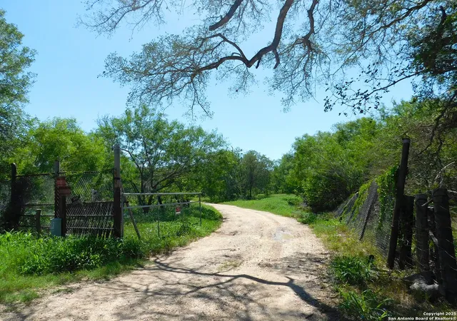 Photo 1 of Land for sale at 1590 Mccauley Rd, Floresville, TX 78114 | MLS# 1876495 | Listing updated on 2025-12-12