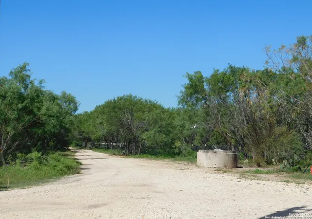Photo 2 of Land for sale at 1590 Mccauley Rd, Floresville, TX 78114 | MLS# 1876495 | Listing updated on 2025-12-12