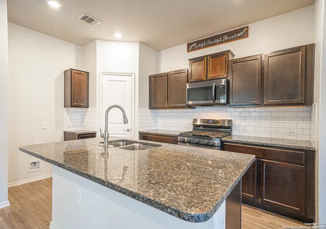 Photo 3 of Single family home for sale at 7119 Magnolia Bluff, San Antonio, TX 78218 | MLS# 1876690 | Listing updated on 2025-12-31