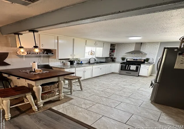 Photo 4 of Single family home for sale at 1518 Logwood Ave, San Antonio, TX 78221 | MLS# 1880604 | Listing updated on 2025-11-09