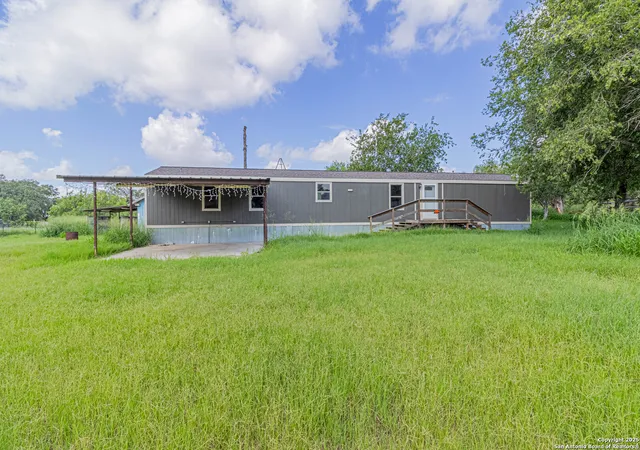 Photo 1 of Manufactured home for sale at 18065 County Road 163, Elmendorf, TX 78112 | MLS# 1882507 | Listing updated on 2025-12-19