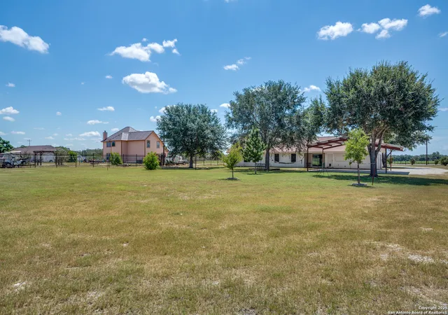 Photo 3 of Single family home for sale at 1411 County Road 320, Floresville, TX 78114 | MLS# 1892160 | Listing updated on 2025-09-10