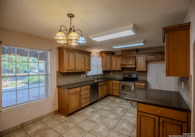 4th image of 13303 Flying W Trl, Helotes, TX 78023 | MLS# 1896593