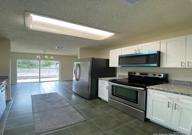 Photo 3 of Single family home for sale at 9406 Bendell, San Antonio, TX 78250 | MLS# 1910449 | Listing updated on 2025-11-23