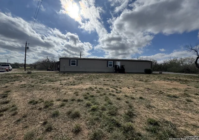 Photo 1 of Manufactured home for sale at 2605 County Road 101, Floresville, TX 78114 | MLS# 1930482 | Listing updated on 2026-01-26