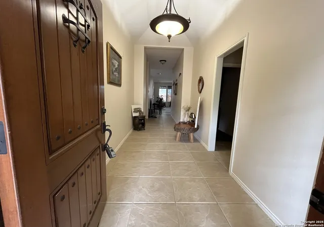 Photo 3 of Single family home for sale at 8707 Sarasota Woods, San Antonio, TX 78250 | MLS# 1935787 | Listing updated on 2026-02-10