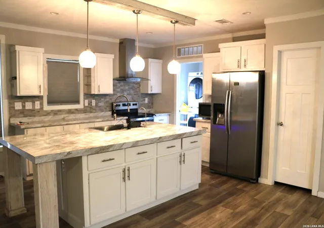Photo 3 of Manufactured home for sale at 387 Private Road 1525, Bandera, TX 78003 | MLS# 1952678 | Listing updated on 2026-04-07