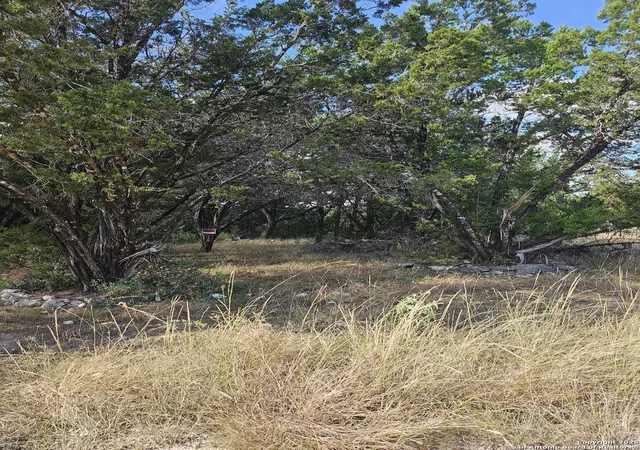 Photo 1 of Land for sale at 1645 Whispering Hills, Canyon Lake, TX 78133 | MLS# 1954337 | Listing updated on 2026-07-17