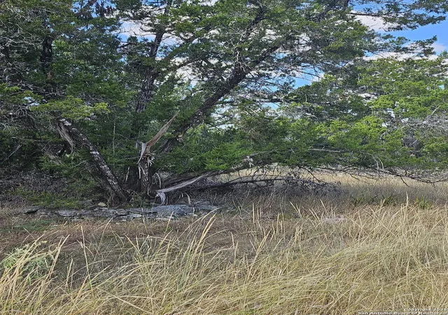 Photo 2 of Land for sale at 1645 Whispering Hills, Canyon Lake, TX 78133 | MLS# 1954337 | Listing updated on 2026-07-17