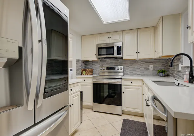 Listing Photo 1 - Condo for sale in building located at 11303 Vance Jackson, San Antonio, TX 78230 - Unit #L2